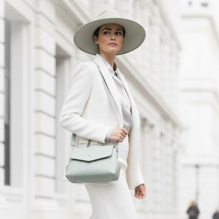 Untitled Bestseller Design for Mashhad Leather Portfolio Description (Final and Objective) This bag was designed for the Mashhad Leather brand. Upon entering the market, this model became one of their bestsellers in mass production volume, demonstrating the design'