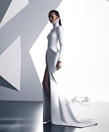 The Neoteric Project Collection More than just a dress, it's an architectural masterpiece. A style that blends purity with power, featuring sharp structural details and a futuristic high collar. A bold white design that embodies elegance in its simplest y